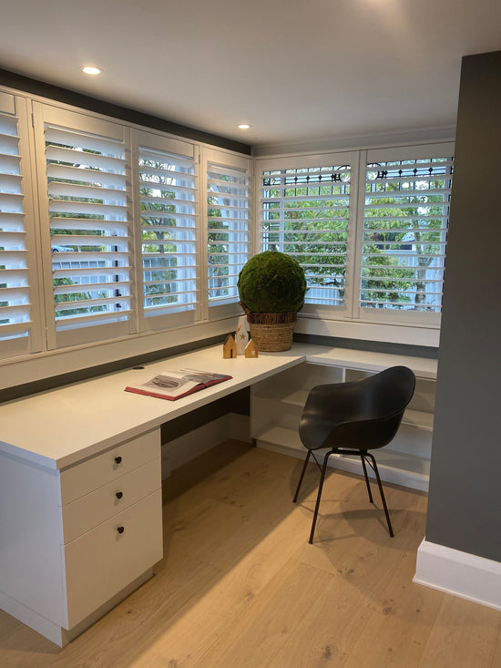 corner shutter in office space wood floor